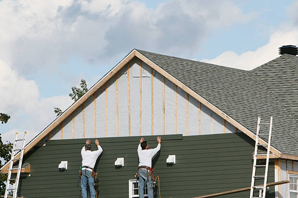 Professional Siding Repair technician working in Aurora, IN